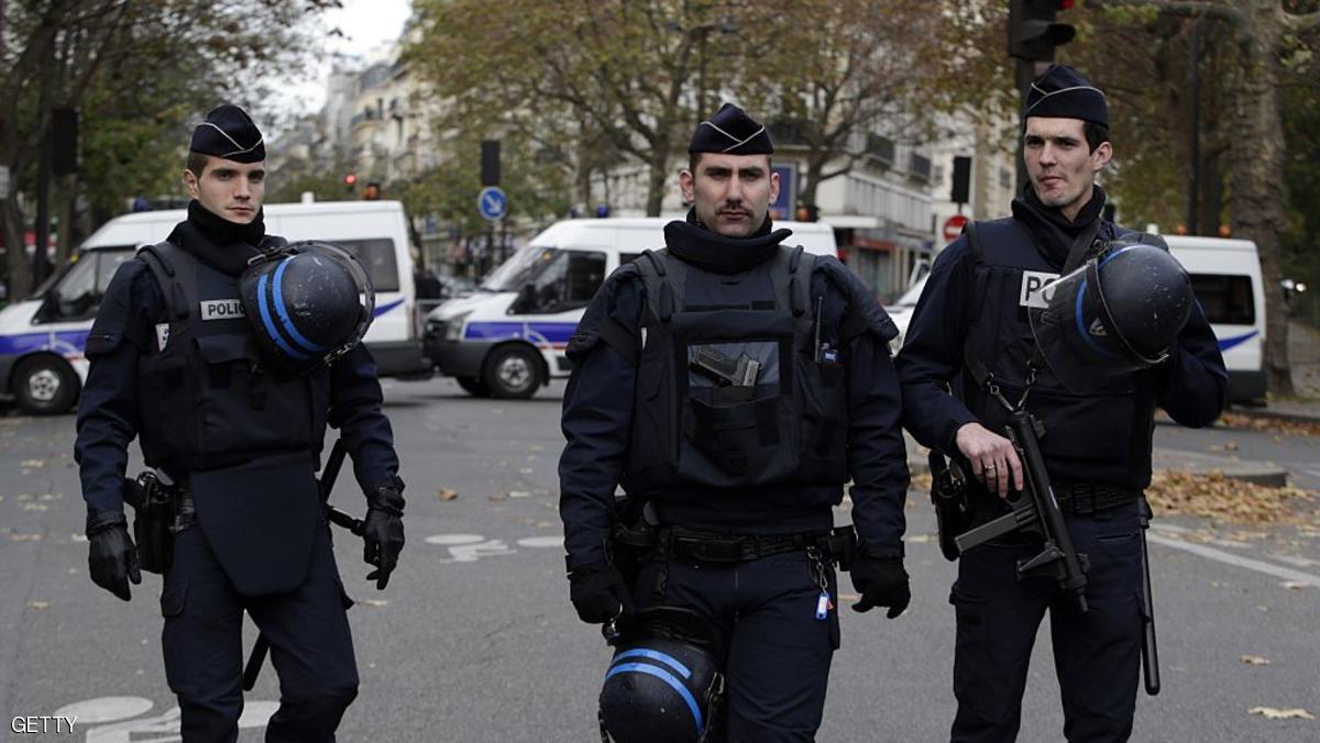 Policemen patrol near the Bataclan theatre in the 11th district of Paris on November 14, 2015, after a series of attacks on the city resulting in the deaths of at least 120 individuals. More than a hundred people were gunned down at the Bataclan theatre in Paris late Friday during a concert by the US band Eagles of Death Metal. AFP PHOTO / KENZO TRIBOUILLARD (Photo credit should read KENZO TRIBOUILLARD/AFP/Getty Images)