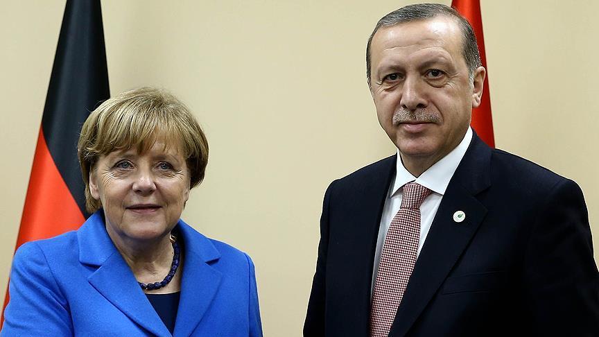 أردوغان يلتقي ميركل في هامبورغ
