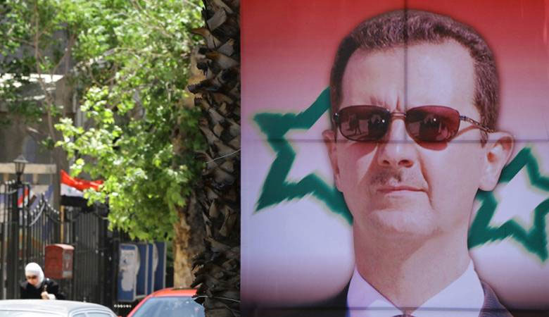 واقعة لا تصدق .. حرق صورة كبيرة لـ”بشار” في دمشق