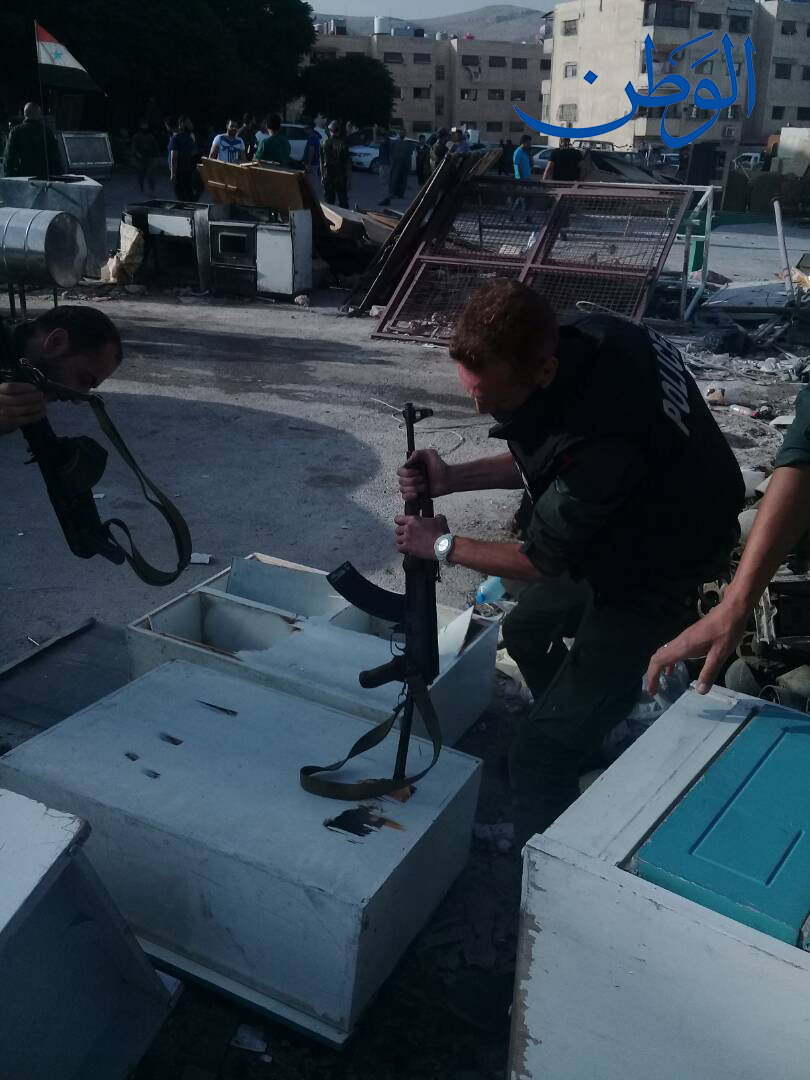 شاهد بالصور: شرطة النظام تداهم سوق التعفيش في ضاحية الأسد