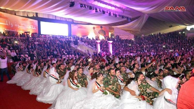 أكبر عرس جماعي في سورية 1100 عروس وعريس (صور)