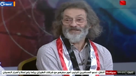 بالفيديو: من وسط دمشق… كاتب بلجيكي يصف بشار الأسد بـ (الدكتاتور) على الهواء مباشرة
